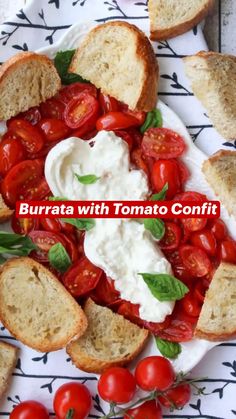 a white plate topped with bread and tomatoes