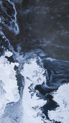 an aerial view of some water and ice