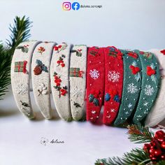 a bunch of christmas themed headbands sitting on top of a table