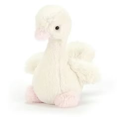 a white stuffed duck with pink feet