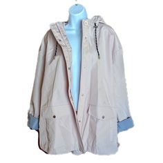 Womens Weatherproof Raincoat Hooded Color Is Cream With A Light Pink Hue Navy And White Striped Lining Labeled 2x Measures 28" Across Chest, 28" Long No Flaws New With Tags Casual Weatherproof Hooded Jacket For Spring, Trendy Winter Raincoat For Outdoor Activities, Trendy Winter Outdoor Raincoat, Trendy Outdoor Winter Raincoat, Casual Waterproof Hooded Jacket For Spring, Trendy Hooded Outerwear For Rainy Weather, Hooded Weatherproof Raincoat For Spring, Weatherproof Hooded Raincoat For Spring, Spring Weatherproof Hooded Raincoat