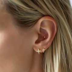 Tiny Cross Huggie earrings that fit snug around your ear. Great for those who have small earlobes. Perfect to wear on your secondary holes or cartilage for those with large earlobes. Gold Vermeil Hypoallergenic, lead and nickel free Width 0.24in(6mm), Hoop Thickness 0.08in(2mm) Inside Diameter: 0.24in(6mm), Not for first hole Hinge Closure #E540-G Dainty Huggie Cartilage Earrings For Everyday, Everyday Huggie Cartilage Earrings, Gold Huggie Cartilage Earrings For Everyday, Everyday Tiny Huggie Cartilage Earrings, 2nd Hole Piercing Earrings, Gold Hypoallergenic Cross Earrings, Knots Jewelry, Huggie Earrings Gold, Jewelry Gift Guide