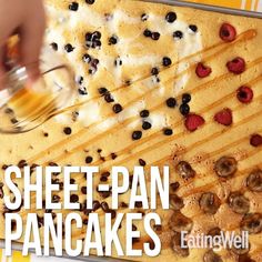 a pan filled with pancakes covered in toppings