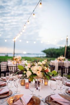 the table is set up for an elegant dinner