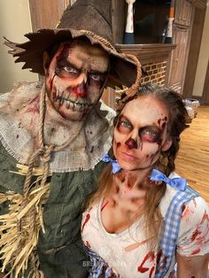 Man and woman dressed as zombie version of Scarecrow and Dorothy from Wizard of Oz Zombie Costume Ideas For Couples, Zombie Wizard Of Oz, Couples Scarecrow Halloween Costumes, Zombie Dorothy Wizard Of Oz, Spooky Scarecrow Costume, Zombie Couple Halloween Costumes, Couple Halloween Costumes Face Paint, Zombie Scarecrow Makeup, Dorothy Halloween Makeup