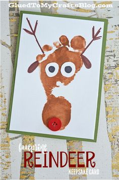 a reindeer handprinted on a piece of paper