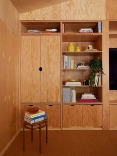 Plywood cabinetry and cork floor is a perfect match. More design ideas with the material ahead.