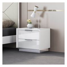 a white night stand with two drawers and a lamp next to it on a carpeted floor