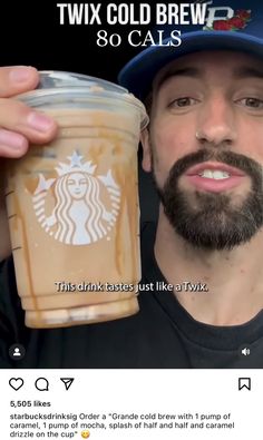 a man is holding up a cup of coffee with the caption twix cold brew