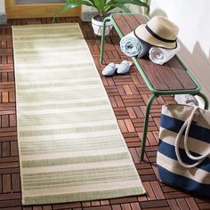 Courtyard indoor-outdoor rugs bring interior design style to busy living spaces, inside and out. Courtyard is beautifully styled with patterns from classic to contemporary, all in colors, shapes, and sizes to fit any area. Courtyard area rugs are made with enhanced polypropylene in a special sisal weave that achieves intricate designs that are easy to maintain - simply clean with a garden hose. Safavieh Courtyard Dobby 2 X 12 (ft) Beige/Sweet Pea Indoor/Outdoor Stripe Runner Rug Polyester in Gre Durable Flooring, Outdoor Rocking Chairs, Stylish Rugs, Patio Rugs, Transitional Area Rugs, Rugs Size, Indoor Outdoor Area Rugs, Outdoor Area Rugs, Beige Rug