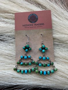 New without tags* JEWELRY TYPE : Earrings * METAL : Sterling Silver * MAIN STONE : Turquoise * TRIBAL AFFILIATION : Navajo     These are a beautiful pair of Navajo Sterling Silver and Sonoran Mountain Turquoise Dangle Earrings. These earrings measure 2 1/2 inches long and 1 1/2 inches wide.      Thank you for looking at our items. Please contact us if you have any questions.     2/15/23    Exported By ExportYourStore :) SKU:436849443145_973E* Turquoise Dangle Earrings, Knot Bangle, Bouquet Charms, Native American Earrings, Turquoise Earrings Dangle, Photo Charms, Earrings Metal, Silver Chain Bracelet, Engraved Jewelry