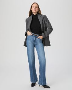 This sleek wide leg is designed with a high-rise and a flattering bow leg. This pair is crafted in PAIGE VINTAGE denim with a portion of organic cotton and comes in a light/medium wash with lived-in details. PAIGE VINTAGE takes all the work out of breaking in your favorite pair of vintage jeans. We've combined the comfort of stretch with everything you love about authentic vintage denim to create super soft jeans that feel perfectly lived-in from the very first wear. Eco-positive methods and mod Fall Workwear Denim Blue Wide Leg Pants, Denim Blue Wide Leg Pants For Fall Workwear, Chic Wide Leg Pants In Denim Blue For Fall, Fall Denim Blue Wide Leg Pants For Work, Chic Medium Wash Wide Leg Pants For Fall, Medium Wash Wide-leg Flare Jeans For Work, Modern Denim Wide Leg Pants For Fall, Chic Denim Wide Leg Pants For Fall, Classic Denim Wide Leg Pants For Fall