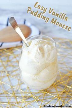 an easy vanilla pudding mousse in a glass with a spoon