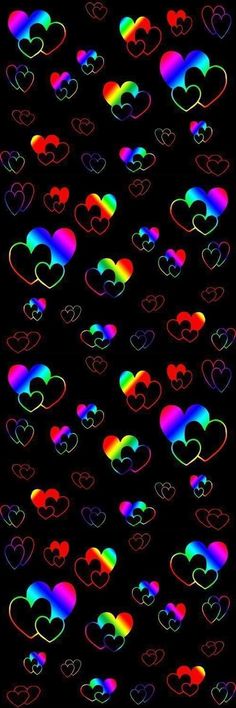 many different colored hearts on a black background