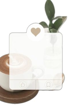 a coffee cup and saucer with a heart sticker on the top, sitting next to each other