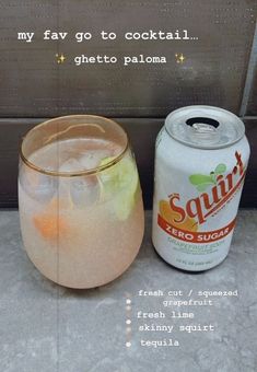 a can of soda next to a glass filled with liquid