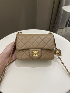 Chanel Pearl Crush Mini SquareDark Beige Lambskin AGHWSize 17 x 12.5 x 7 cmAdjustable ChainMicrochipAug 20229.7/10 Like New (minor rubs at back pocket, minimal sign of use otherwise almost like new)Includes full set box, dust bag and receiptPrice now 5900 sgd 4360 usd CN5690-01 Beige Chanel Bag, Chanel Pearl Crush, Chanel Pearl, Chanel Pearls, Beige Bag, Gold Ounce, Dark Beige, Diaper Backpack, Blue Jacket