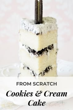 a piece of cake on a plate with the words from scratch cookies and cream cake