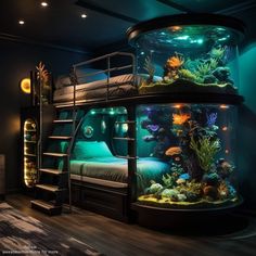 a bedroom with two beds and a fish tank in the middle of it, next to a bunk bed