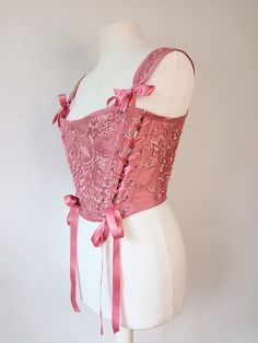 Beautiful mauve pink / vintage rose lace and silk handmade stays / corset! Free worldwide shipping and sent with a tracking number. This is a custom made design, please send me your bust and waist measurements. Crafted from mauve pink / vintage rose 100% silk covered in beautiful pink lace. The front panel is reversible and the other side is the plain mauve pink silk. Laced down two sides of the front panel which can be turned around. Mauve pink silk for bias binding and lovely pink satin ribbon Stays Corset, Corset Stays, Coquette Princess, Corset Outfit, Fairytale Fashion, Pink Corset, Vintage Corset, Satin Ribbons, Bias Binding