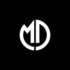 the letter m in a circle on a black background