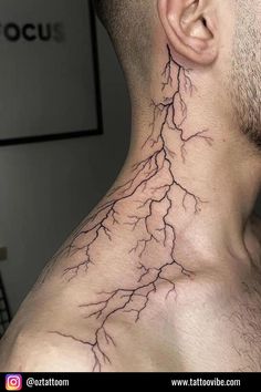 a man's neck is covered with wires