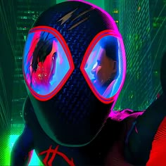 a man in a futuristic suit with red and blue goggles looking at the camera