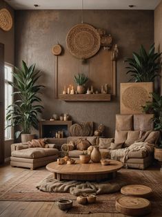 a living room filled with furniture and potted plants on top of a wooden table