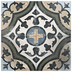 an artistic tile design in blue, green and white with a cross on the center