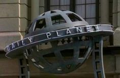 a giant metal object with the words daily planet on it