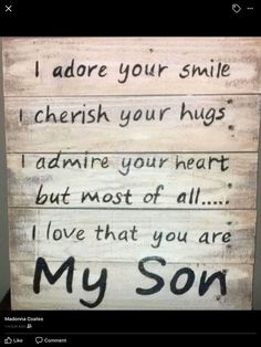 a wooden sign that says, i adore your smile cherish your hugs admire your heart but most of all love that you are my son