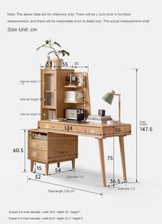 a wooden desk with drawers and a lamp on the top, measurements for each drawer