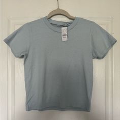 Pacsun Light Blue Basic T Shirt Size- One Size, But Fits Like A Small Color- Light Blue New With Tags- Never Worn Before Last Photo Shows The Shirt Modeled Casual Light Blue T-shirt For Summer, Light Blue Short Sleeve T-shirt For Summer, Light Blue Summer T-shirt For Everyday, Blue Plain Shirt For Summer, Basic Solid Summer Shirt, Summer Everyday Washed Blue T-shirt, Blue Short Sleeve Summer Tops, Blue Crew Neck Short Sleeve Top For Everyday, Trendy Washed Blue Summer Shirt