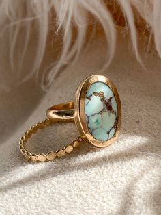 A stunning oval sand hill turquoise set in a 14k Gold Filled setting and band. Torquise Rings Gold, Turquoise Stone Rings, Gold And Turquoise Ring, Turquoise And Gold Jewelry, Gold Turquoise Jewelry, Cosmetics Catalogue, Turqoise Ring, Pretty Gemstones, Turquoise Ring Gold