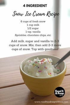 a yellow bowl filled with ice cream and sprinkles on top of a wooden table