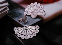 Add a touch of elegance to your everyday look with these 925 Silver Filigree Fan Earrings. Handcrafted from premium sterling silver, these earrings are all about versatility and style. They feature a simple small circle that you can wear alone for a casual vibe, and a fan-shaped attachment to add whenever you want a little extra flair. Day to Night Versatility: Wear just the small circle (1 cm / 0.4 inches) for a minimalist, chic look during the day. When it's time for a night out, easily attach the fan piece (3.0 cm / 1.2 inches wide) for an elevated, elegant style. With the unique filigree design and intricate silver dot details, these earrings are perfect for transitioning from day to evening. ✨ Key Features: Material: Made with high-quality 925 Sterling Silver that shines bright Handcr Small Circle, Fan Earrings, Minimalist Chic, Filigree Design, Silver Filigree, One Design, Jewelry Earrings Studs, Chic Look, Elegant Style