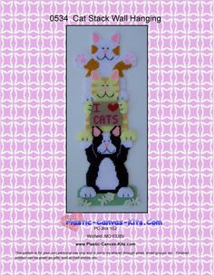 a cross stitch pattern for a cat and dog wall hanging