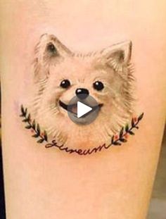 a small dog tattoo on the leg