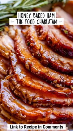 sliced ham on a plate with rosemary sprigs