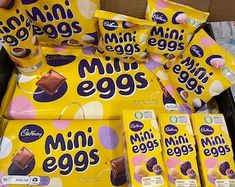 several packages of mini eggs are stacked on top of each other