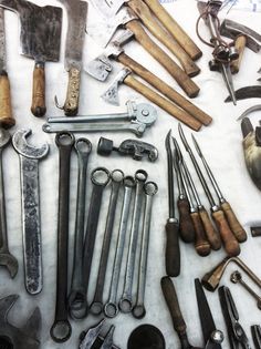 there are many different tools that can be found in this photo, including wrenches and pliers