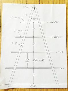 a drawing of a triangle on top of a piece of paper with lines drawn across it