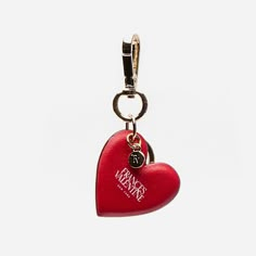 Red heart keychain in shiny nappa leather. Nappa leather. Gold hardware. Imported. Luxury Leather Keychains With Interior Holder, Gift Keychain With Logo Charm, Logo Charm Keychains For Gifts, Red Keychain, Love Keychain, Frances Valentine, Girly Accessories, Heart Keychain, Gem Ring