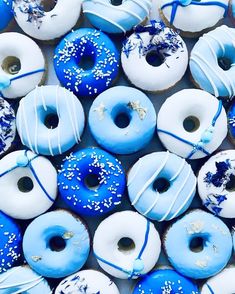 blue and white donuts with sprinkles on them