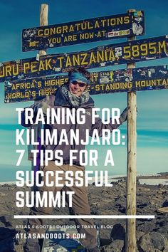 a man standing on top of a sign post with the words training for kilimanjaro 7 tips for a successful summit