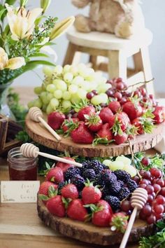 a table topped with lots of different types of fruit