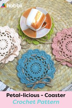 four crochet coasters on a table with coffee cup and saucer in the middle