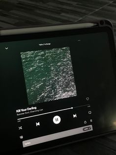 a tablet with an audio player on top of it