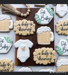 baby is brewing decorated cookies on a table