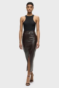 Description Our Reconstructed Skirt in Marbled Vegan Leather hits below the knee with a midi length. It features a front slit and is made from vegan leather with a marbled finish. Complete with matte black trim. Product Details Center Front Length: 34", Center Back Length: 34", Sweep: 33.5"Model Height 5'9"Model wearing size 25Measurements based on size 27 Fit & Care Content: 100% Polyurethane Back: 100% PolyesterMachine wash cold with like colorsDo not bleachTumble dry low or hang to dry Family Women, Kick Flares, Denim Branding, Men Fits, Hudson Jeans, Denim Coat, White Summer, Black Trim, Denim Shop